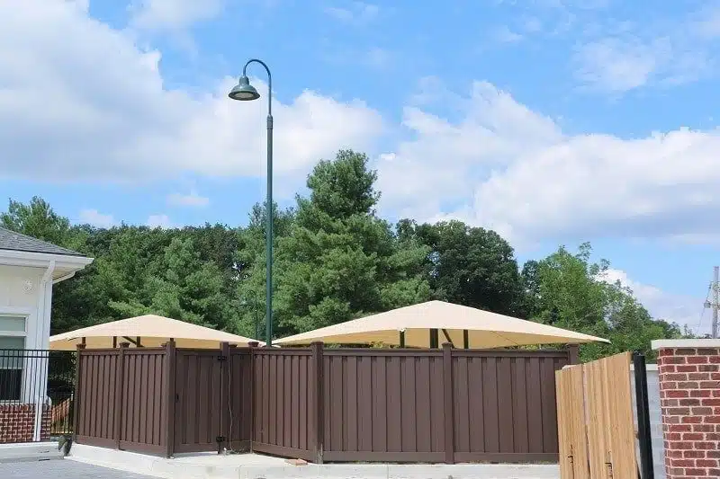 The Goddard School Trex Fencing Trex Fencing separating a parking area from a playground.